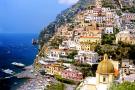 Positano, Campania. The Amalfi Coast, which takes its name from the town of Amalfi, is a stretch of coast renowned worldwide for its scenic beauty. Positano is one of the most characteristic towns and a destination for the international jet set.